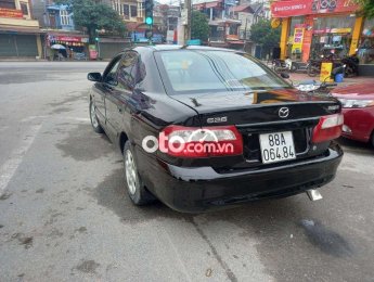 Mazda 626 MT 2003 - Bán xe Mazda 626 MT năm 2003, màu đen, nhập khẩu