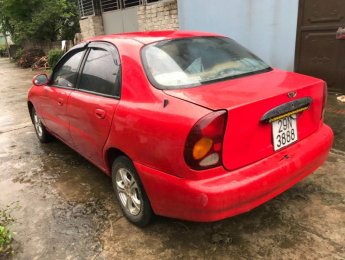 Daewoo Lanos MT 2001 - Cần bán xe Daewoo Lanos MT năm sản xuất 2001, màu đỏ số sàn