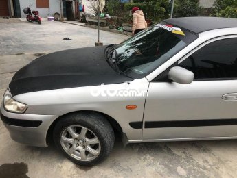 Mazda 626 2002 - Cần bán xe Mazda 626 MT đời 2002, màu bạc, nhập khẩu, 110tr