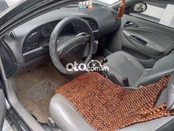 Daewoo Nubira 2002 - Cần bán lại xe Daewoo Nubira 2.0 sản xuất năm 2002, màu đen
