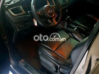 Kia Rondo 2016 - Xe Kia Rondo 1.7 DAT 2016, màu nâu, xe nhập xe gia đình 