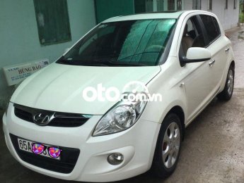 Hyundai i20 2010 - Xe Hyundai i20 1.4AT đời 2010, màu trắng xe gia đình