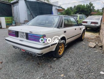 Nissan Bluebird 1984 - Bán Nissan Bluebird sản xuất 1984, màu trắng, nhập khẩu nguyên chiếc