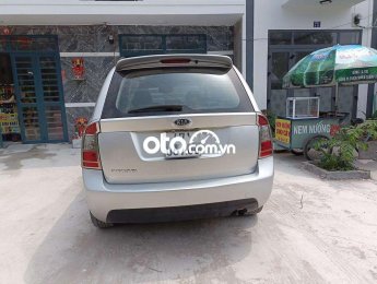 Kia Carens MT 2010 - Xe Kia Carens MT năm sản xuất 2010, màu bạc