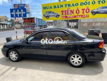 Kia Spectra 2002 - Cần bán xe Kia Spectra năm sản xuất 2002, màu đen chính chủ, 79tr