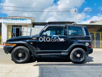 Ssangyong Korando 2002 - Bán Ssangyong Korando MT sản xuất năm 2002, màu đen, nhập khẩu nguyên chiếc còn mới