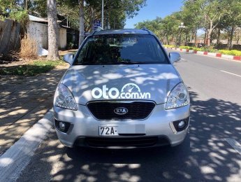 Kia Carens   MT  2015 - Cần bán gấp Kia Carens MT sản xuất 2015, màu trắng còn mới, 320tr