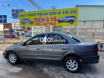 Mazda 323  GLX 1998 - Cần bán gấp Mazda 323 GLX năm sản xuất 1998, màu xám, giá chỉ 60 triệu