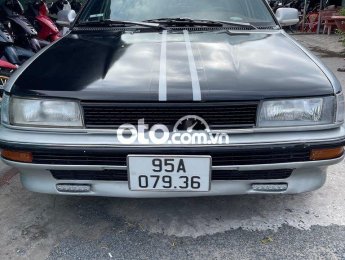 Toyota Corolla     1998 - Cần bán gấp Toyota Corolla sản xuất 1998, màu đen, xe nhập, giá tốt
