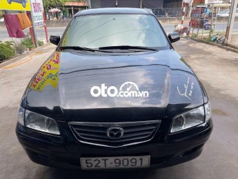 Mazda 626   MT 2002 - Cần bán gấp Mazda 626 MT năm 2002, màu đen