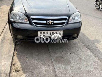 Daewoo Lacetti EX 2009 - Cần bán gấp Daewoo Lacetti EX sản xuất năm 2009, màu đen, nhập khẩu