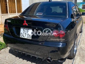 Mitsubishi Lancer 2003 - Bán ô tô Mitsubishi Lancer năm sản xuất 2003, màu đen số tự động, 185tr
