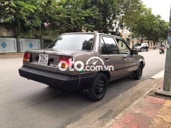 Toyota Corolla 1985 - Bán xe Toyota Corolla sản xuất năm 1985, màu vàng, xe nhập