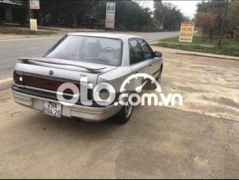 Mazda 323 1995 - Cần bán Mazda 323 năm 1995, màu xám, nhập khẩu nguyên chiếc, giá tốt