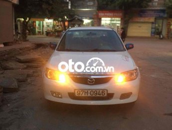 Mazda 323 2003 - Màu trắng chính chủ