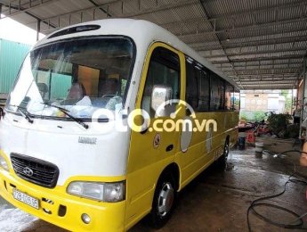 Hyundai County 2010 - 29 chỗ màu trắng vàng
