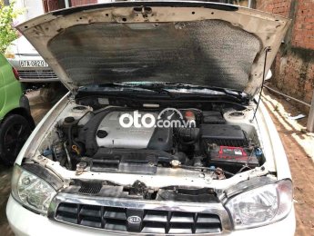 Kia Spectra 2003 - Màu trắng, giá 75tr