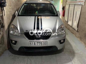 Kia Carens 2012 - Xe màu bạc