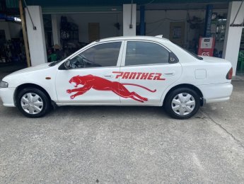 Mazda 323 2000 - Màu trắng, giá 65tr