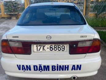Mazda 323 2000 - Màu trắng