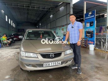 Mazda 626 2003 - Màu vàng, 135 triệu