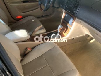 Daewoo Magnus 2004 - Xe gia đình sử dụng