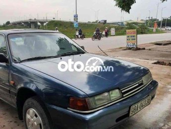 Mazda 626 1994 - Xe màu xanh