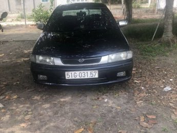 Mazda 323 2000 - Màu đen