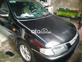 Mazda 323 Cần bán xe oto , giá 115 triệu. 1998 - Cần bán xe oto MAZDA, giá 115 triệu.