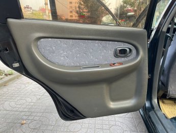 Kia Spectra 2005 - Màu đen, giá 77tr