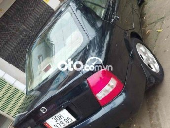 Mazda 323  - 2004 2004 - mazda 323- 2004