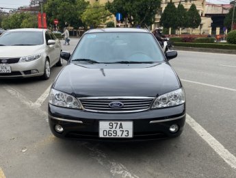 Ford Laser 2004 - Bán  Ford Laser đời 2004, màu đen, giá tốt. liên hệ 0869282752. 