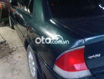Ford Laser Đối xe 7 chỗ nên bán lai 2000 - Đối xe 7 chỗ nên bán lai
